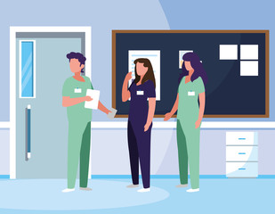 group medicine workers in hospital corridor