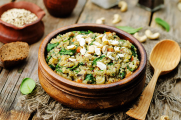lentils mushroom spinach quinoa with fresh spinach leaves and cashews