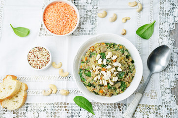 lentils mushroom spinach quinoa with fresh spinach leaves and cashews