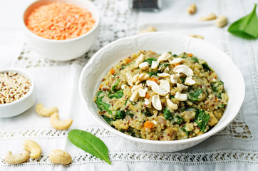 lentils mushroom spinach quinoa with fresh spinach leaves and cashews