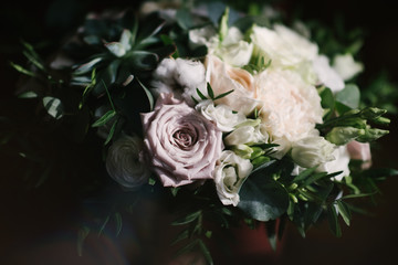 Bridal bouquet of flowers of the bride close up