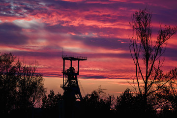 Mine shaft with sunset in the background