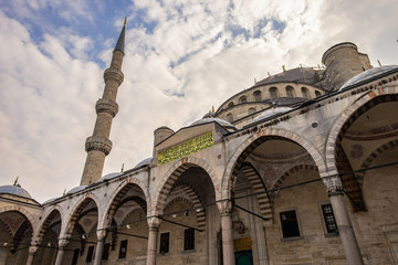 Fototapeta na wymiar The Blue Mosque Istanbul, Turkey. Sultanahmet Camii. Closeup facade with minaret
