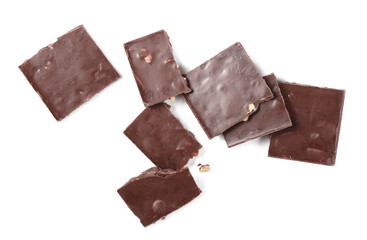 Dark chocolate bars with pear isolated on white background, top view