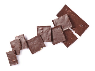 Dark chocolate bars with pear isolated on white background, top view