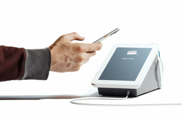 Hand holding mobile phone and POS payment terminal NFC payments. 3d rendering.