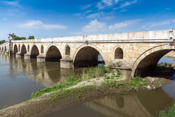 Fototapeta premium Medieval Bridge from period of Ottoman Empire over Meric River in city of Edirne, East Thrace, Turkey