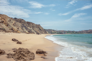 Beautiful sea cost view. Atlantic ocean costline, sandy beach Sangano, Angola under sunlight in summer sunny day
