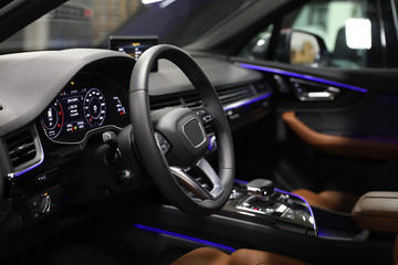 Driver's seat of the car. Sport car interior. steering wheel, shift lever and dashboard - obrazy, fototapety, plakaty