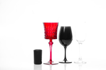 Set of empty glasses for different alcohol drinks and cocktails isolated on white background