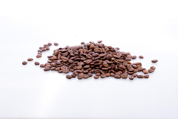 roasted coffee beans isolated on white background top view