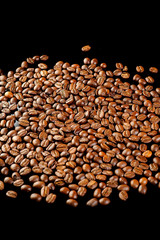coffee beans isolated on black background op view