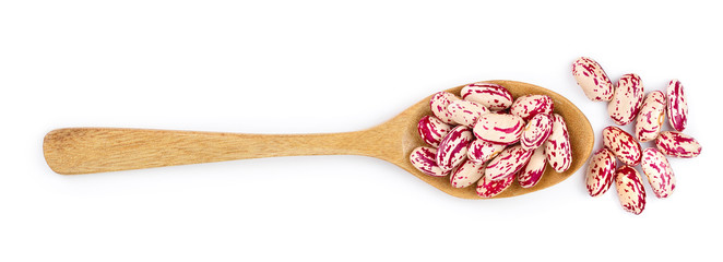 variegated kidney bean in wooden spoon isolated on white background. Top view. Flat lay
