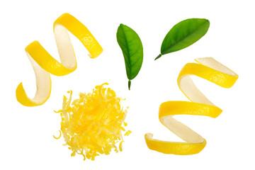 Lemon peel and zest with leaf isolated on white background. Healthy food - obrazy, fototapety, plakaty