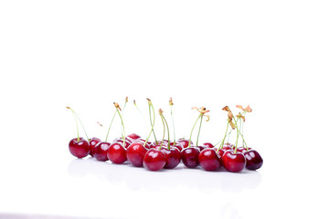 red cherries isolated on white background