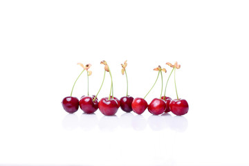 red cherries isolated on white background
