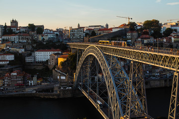 Fototapeta na wymiar View of the Douro river and Dom Luis I Bridge in the center of Porto, Portugal.