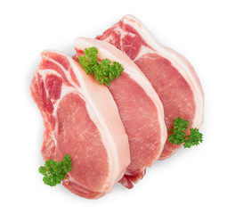 sliced raw pork meat with parsley isolated on white background. Top view. Flat lay