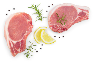 sliced raw pork meat with rosemary and lemon isolated on white background with copy space for your text. Top view. Flat lay