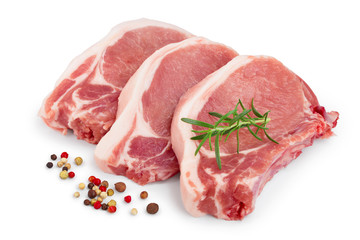 sliced raw pork meat with rosemary and peppercorn isolated on white background