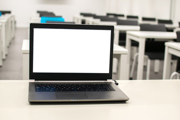 Laptop, online business, teacher work in the classroom.Laptop put on a table or desk