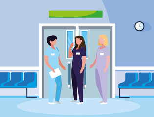 Obraz premium female medicine workers in elevator door