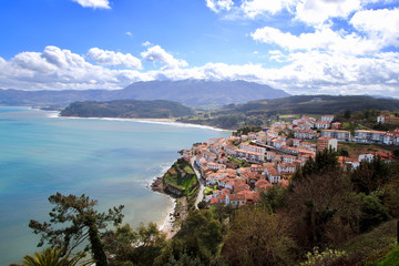 Main view of Lastres village, on of the most beautiful spots in Asturias region, where the snowed Pico de Europa mountains, die close to the sea, Asturias, Spain.