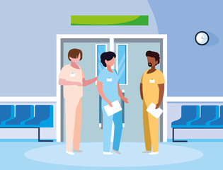 interracial group medicine workers in elevator door