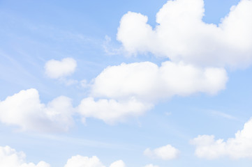 Blue sky and soft white clouds. Natural cloudscape background, texture. Copy space.