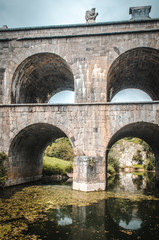 Fototapeta na wymiar Old roman aqueduct by Tounj