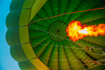 Wallpaper of hot air balloon with fire up from gas engine to make it fly