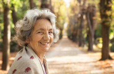 Senior woman walking in the park