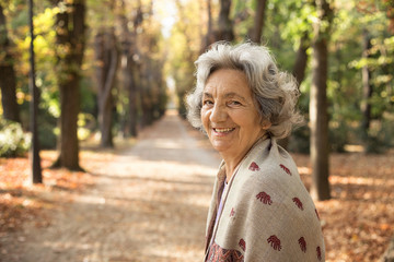 Senior woman walking in the park