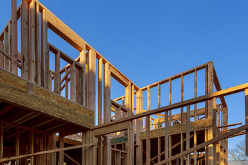 Building of New Home Construction exterior wood beam construction
