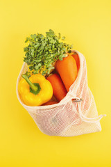 Vegetables in cotton shopping bag.