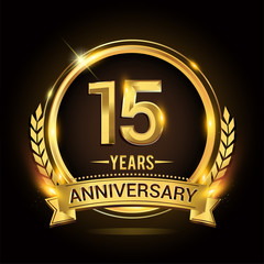 Celebrating 15th years anniversary logo with golden ring and ribbon, laurel wreath vector design.