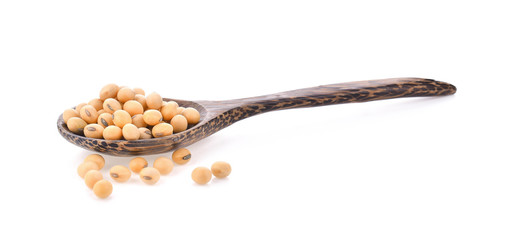 Soy bean in spoon on white background.