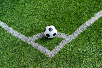 Fototapeta na wymiar soccer Football on Corner kick line of ball and a soccer field , football field , background texture