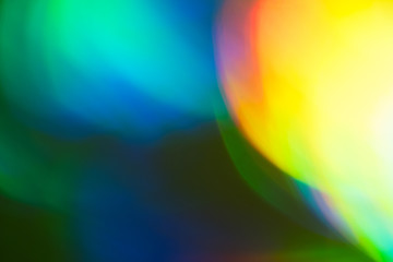 Colorful bokeh light spots. Bright lens flare blurry soft background. Night lanterns.