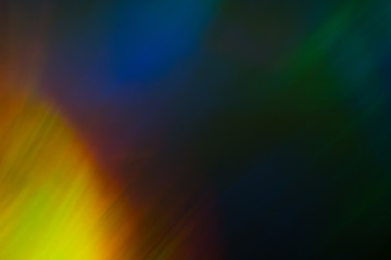Blurred colorful lights. Abstract lens flare effect background. Bokeh illuminated glow.