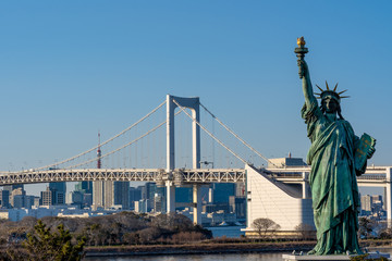 Statue of Liberty and Rainbow bridge, located at Odaiba Tokyo, Japan
