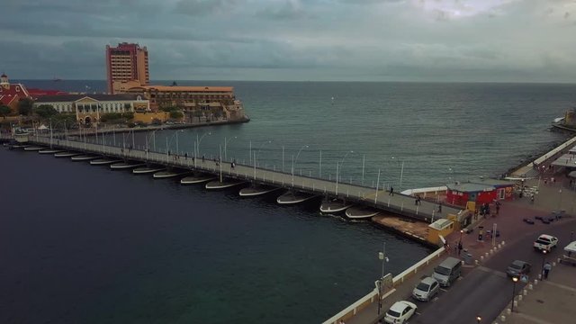 Passing over the famous floating bridge of Curacao looking onto the van der Valk Plaza Hotel