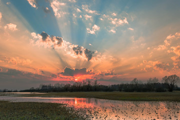 Colorful water landscape during sunset.
