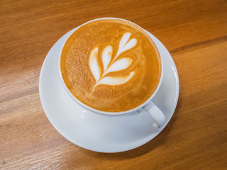 hot cappuccino in white cup, coffee time