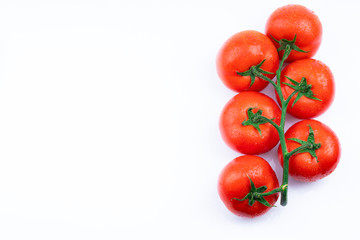 fresh red tomatoes on white background
