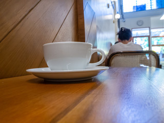 white coffee cup in coffee shop.