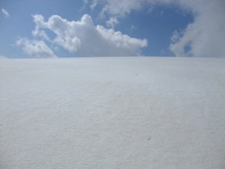 Snow field and blue sky	