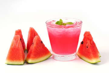 Watermelon juice with mint in glass and slice watermelon isolated on white background