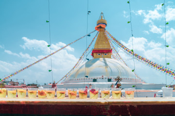 The Buddhist stupa of Boudha Stupa dominates the skyline. It is one of the largest unique structures stupas in the world Located in kathmandu, Nepal.