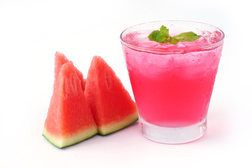 Watermelon juice with mint in glass and slice watermelon isolated on white background